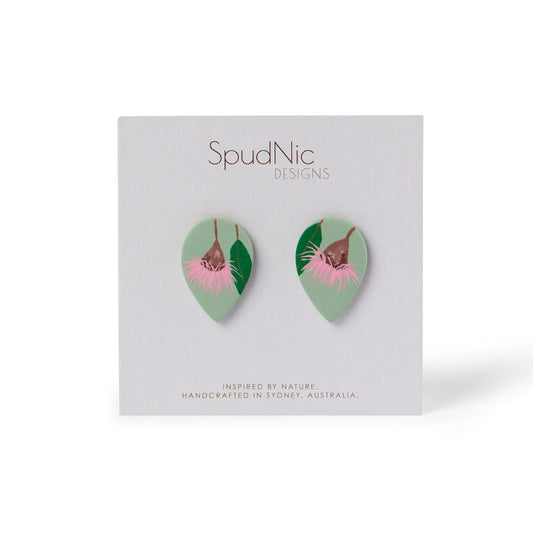 These beautifully handmade stud earrings showcase Australian native flowering gum with it's fairy floss pink blossoms.
