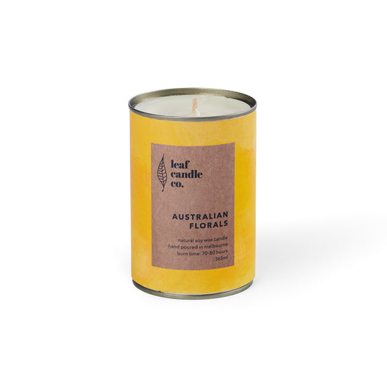 Yellow tin can soy candle with Australian Florals fragrance