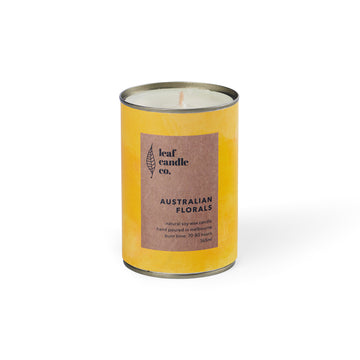 Yellow tin can soy candle with Australian Florals fragrance